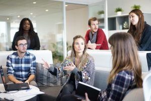 A group at work meeting and having a great discussion