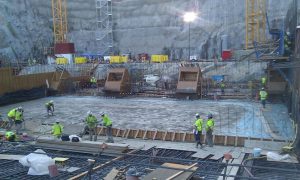 Concrete workers at night